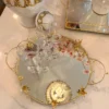 Inspire Me! Home Decor Round Mirrored Tray With Gold Flower Design