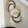 Inspire Me! Home Decor Gold And Black Loop Wall Decor